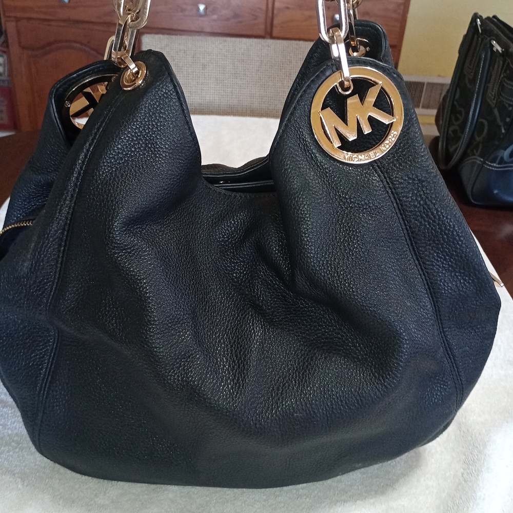 Michael Kors Black Hobo Bag with Gold Accents